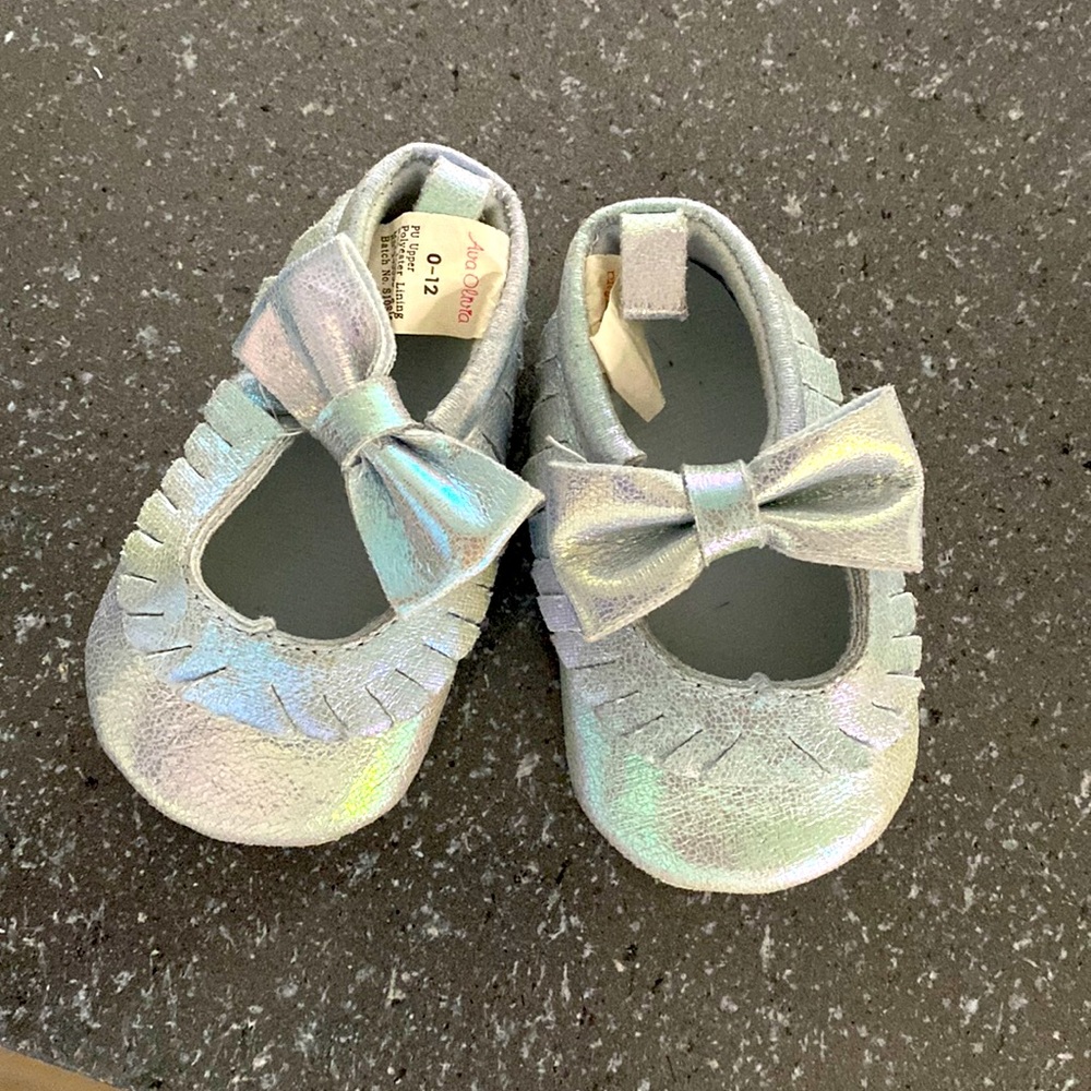 Baby girl moccasins.